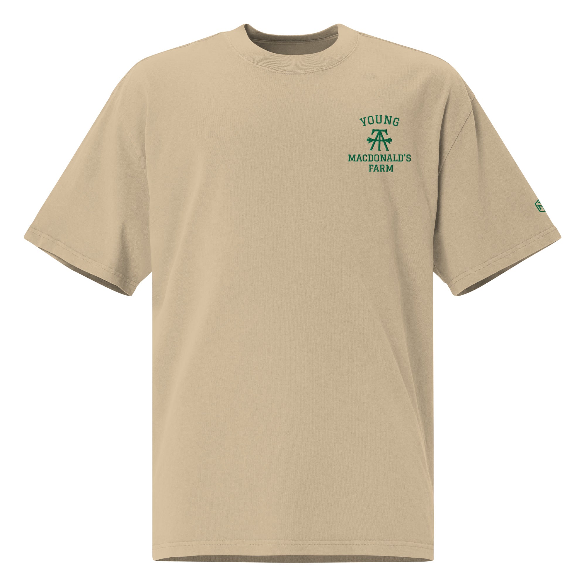 YMF Oversized Faded Tee — faded khaki heavyweight cotton tee with green Young MacDonald's Farm chest wordmark, front view