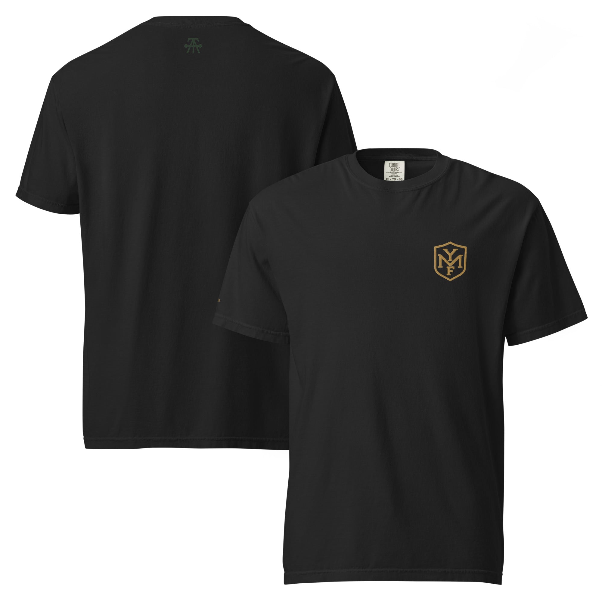 YMF Heavyweight Everyday Tee — black garment-dyed cotton t-shirt with gold left-chest YMF shield, worn front view